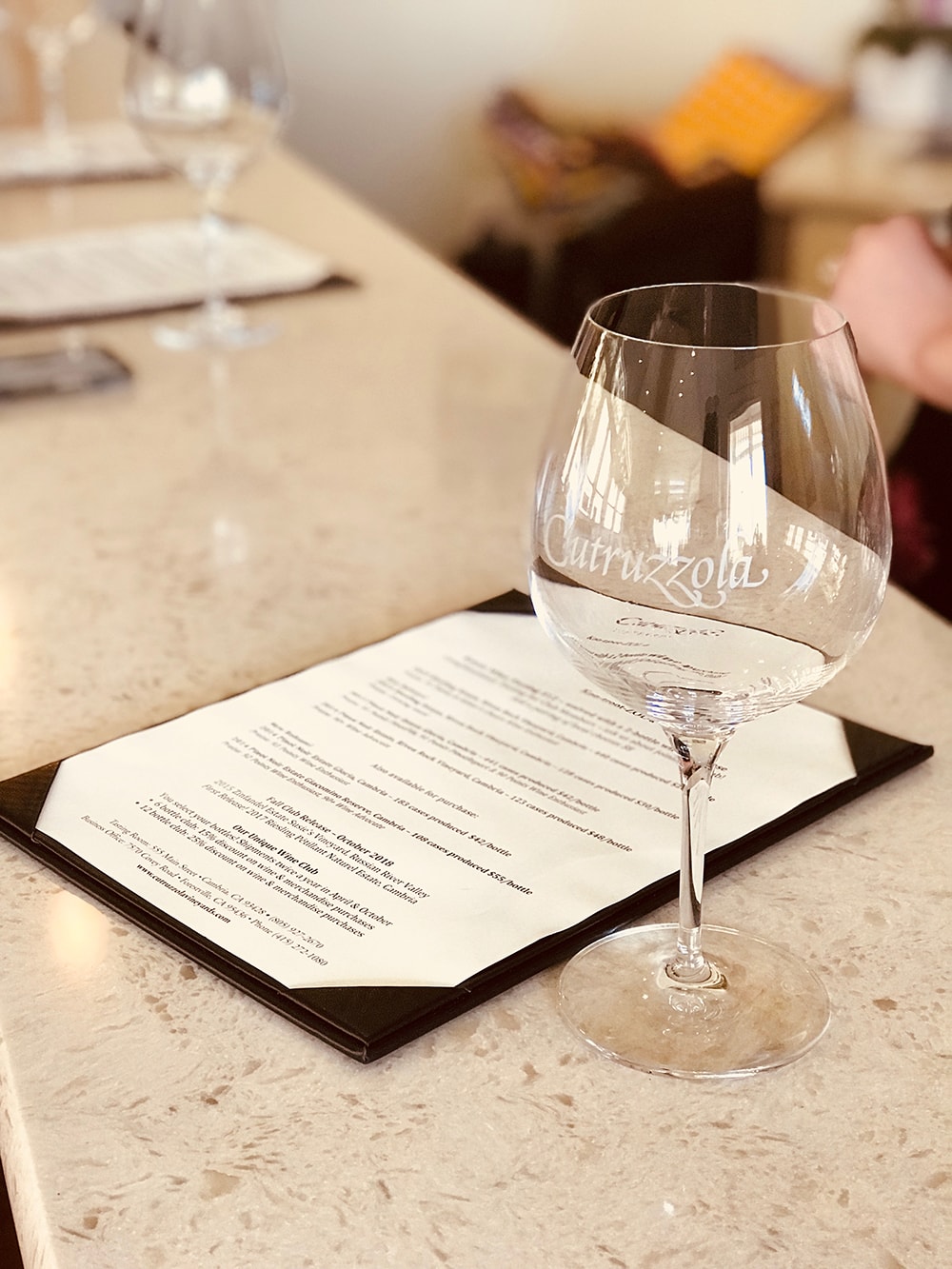 Cutruzola Vineyards menu and wine glass