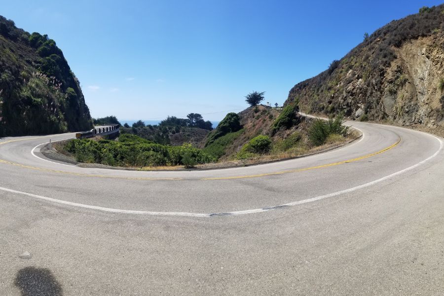 A winding roadway segment of Highway 1, just south of Ragged Point, on the Central Coast of California